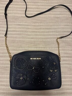 Michael Kors Navy Floral Cutout Crossbody with Gold Chain
